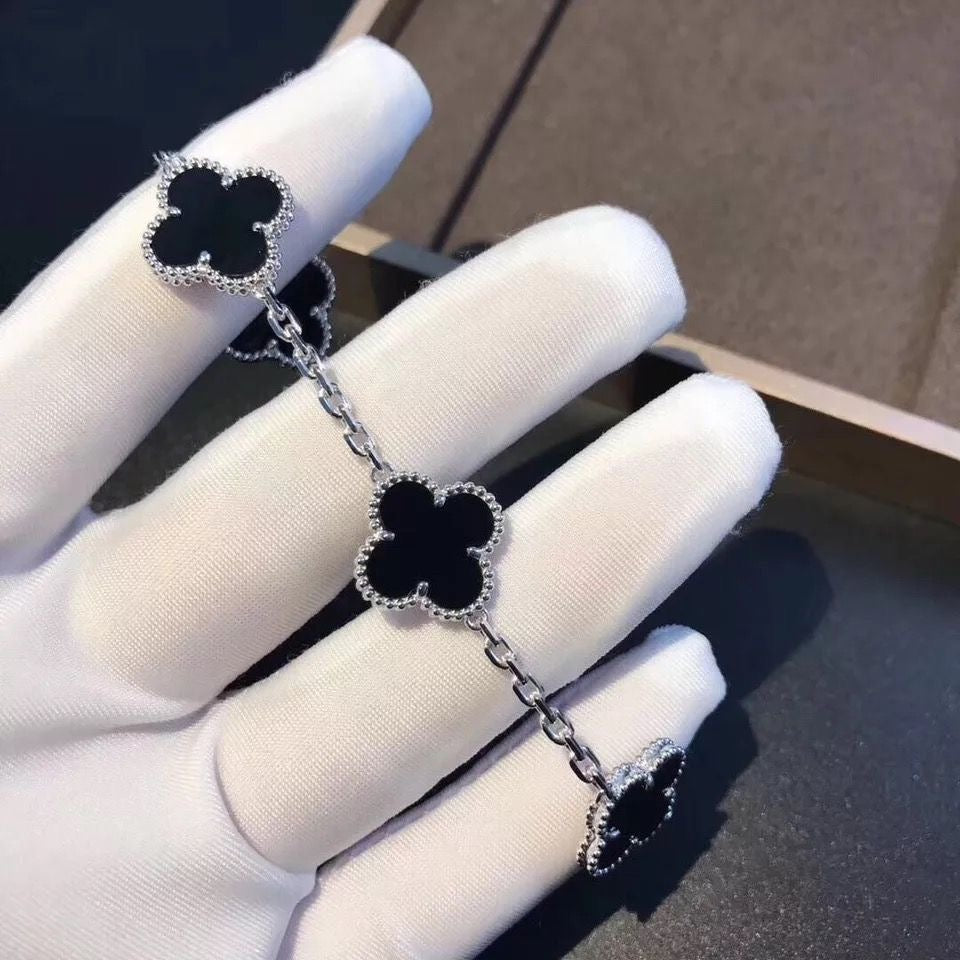 Silver Clover Stainless Steel Bracelet – A Statement of Elegance